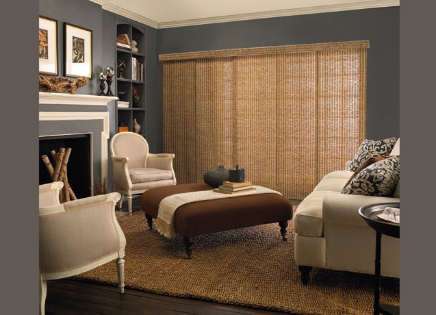 Orlando Living room with navy walls and beige sliding panel tracks.